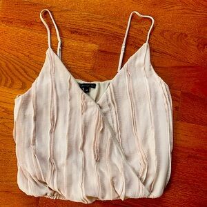 Beautiful beige bubble top. Size medium. Like new!